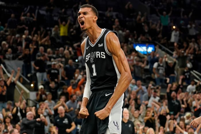 Oct 27, 2023; San Antonio, Texas, USA; San Antonio Spurs forward Victor Wembanyama (1) reacts after dunking during the second half against the Houston Rockets at Frost Bank Center.
